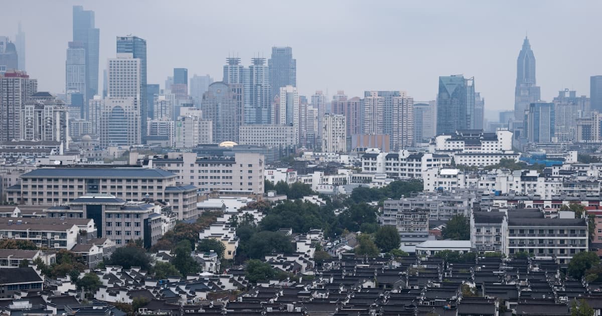 Data comparison chart showing China vs India across population, GDP, and development indicators