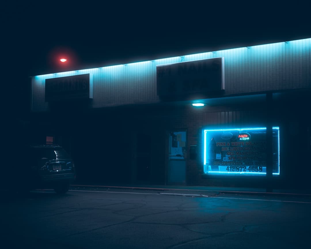 Convenience store at night representing the 7-Eleven location network across the United States